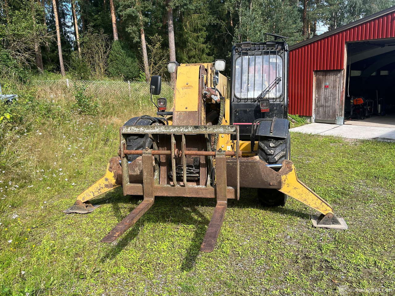Caterpillar TH63, kurottaja piikeillä ja kauhalla, 2002, Loppi - Machine agricole: photos 4 Caterpillar TH63, kurottaja piikeillä ja kauhalla, 2002, Loppi - Machine agricole: photos 4