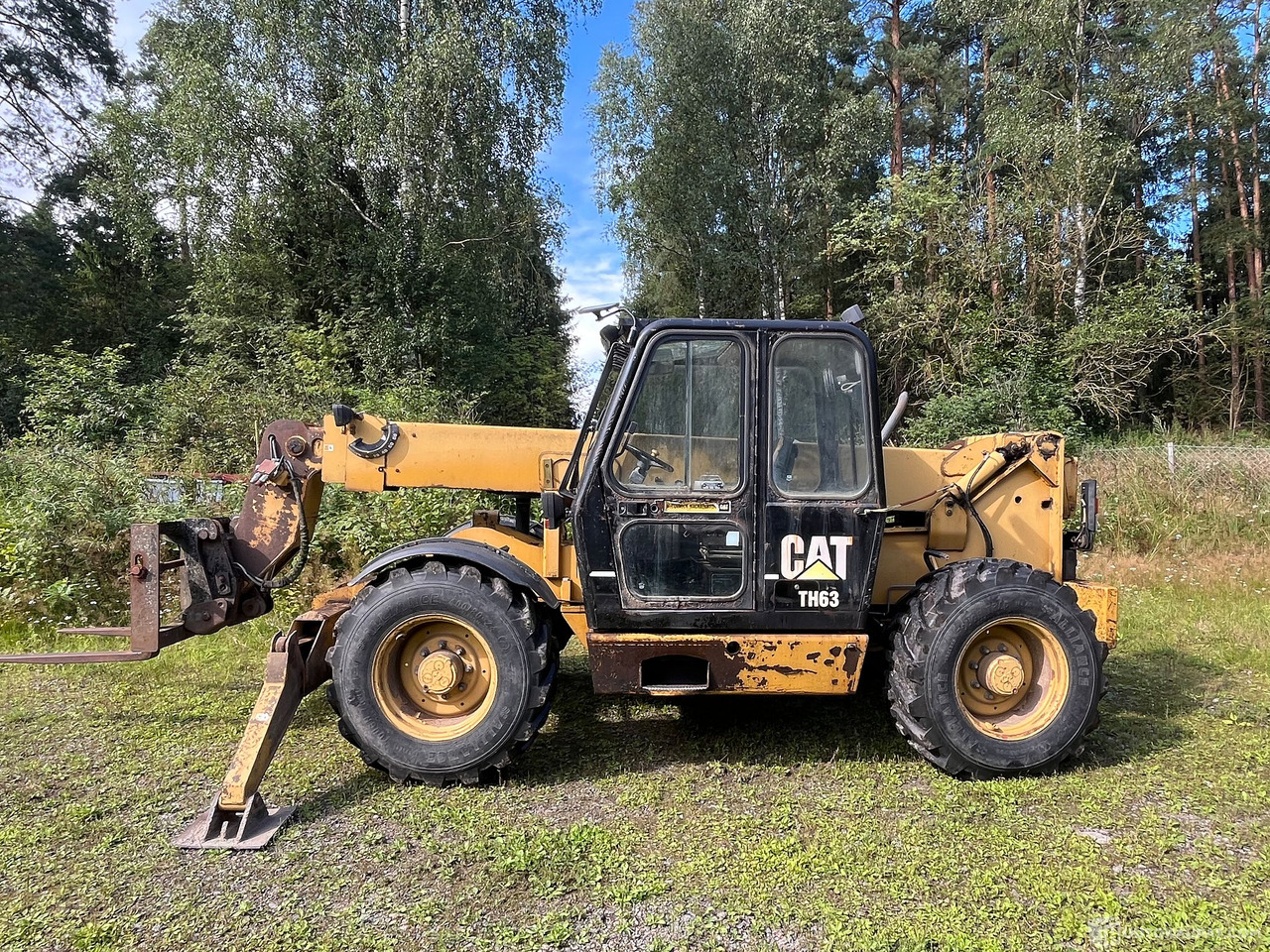 Caterpillar TH63, kurottaja piikeillä ja kauhalla, 2002, Loppi - Machine agricole: photos 3 Caterpillar TH63, kurottaja piikeillä ja kauhalla, 2002, Loppi - Machine agricole: photos 3