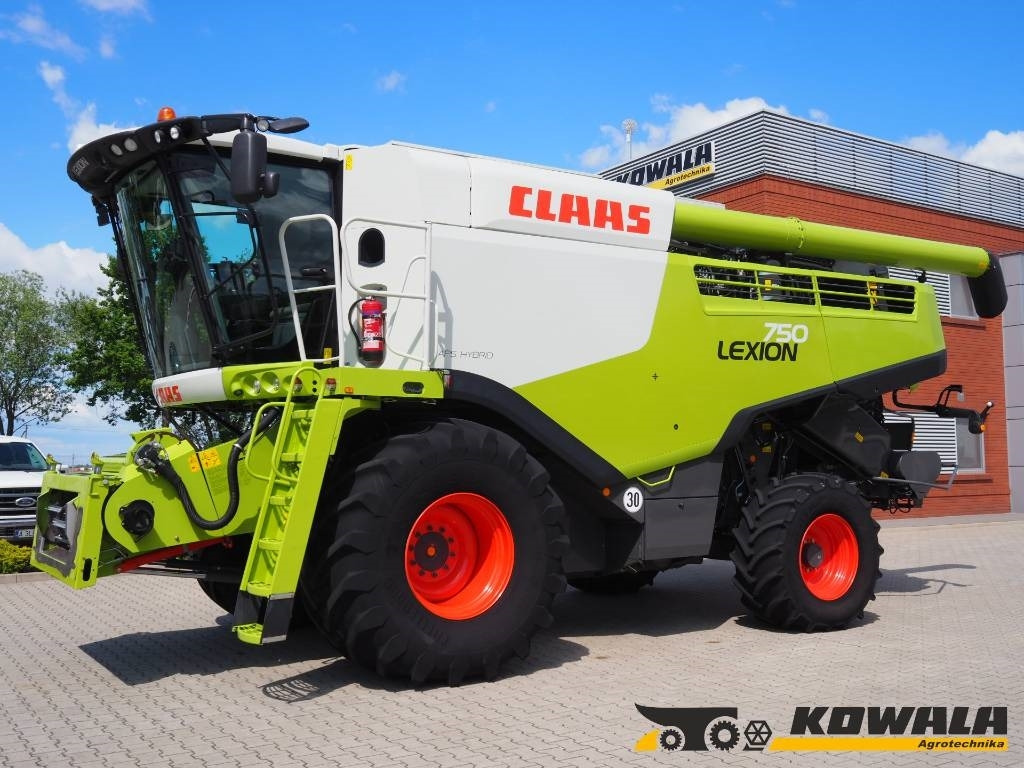 Claas Lexion 750 GPS + V930 - Moissonneuse-batteuse: photos 1 Claas Lexion 750 GPS + V930 - Moissonneuse-batteuse: photos 1
