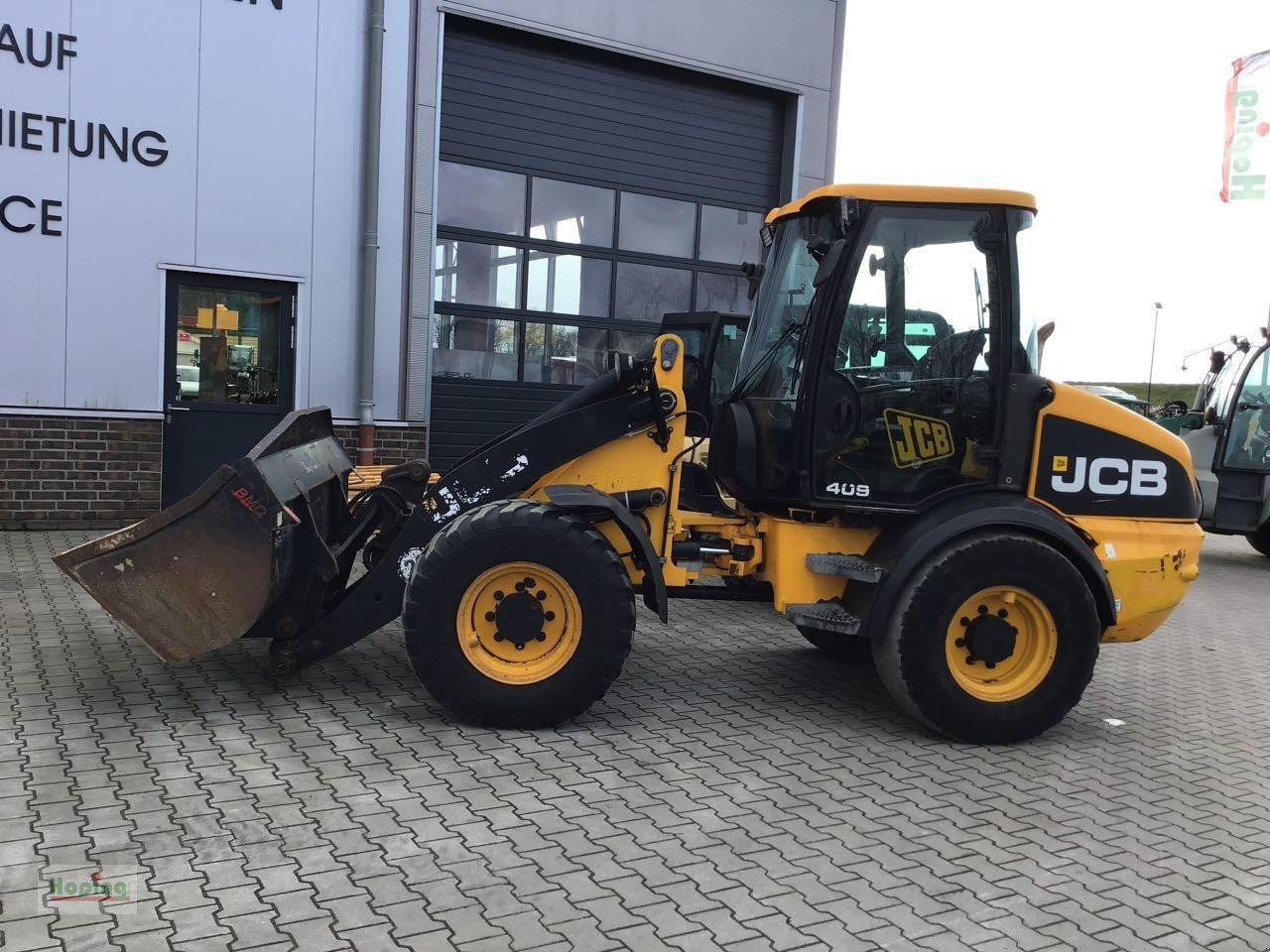 JCB 409 - Chargeuse sur pneus: photos 1 JCB 409 - Chargeuse sur pneus: photos 1