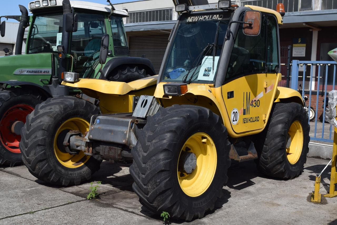 New Holland LM 430 - Chariot télescopique: photos 1 New Holland LM 430 - Chariot télescopique: photos 1