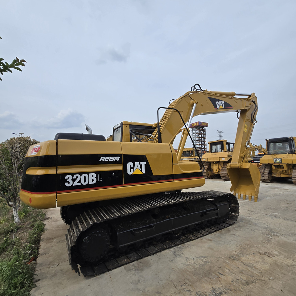 CATERPILLAR 320BL - Pelle sur chenille: photos 5 CATERPILLAR 320BL - Pelle sur chenille: photos 5