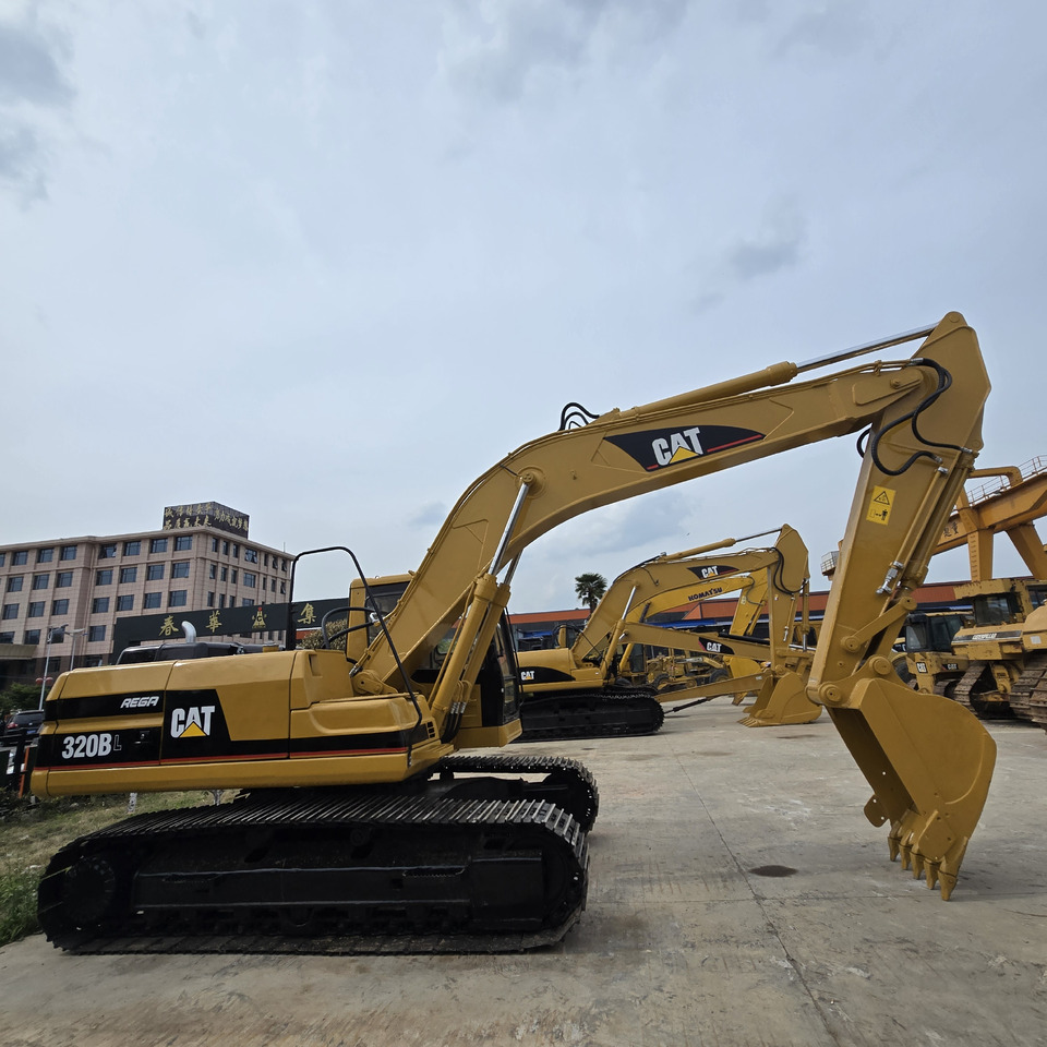 CATERPILLAR 320BL - Pelle sur chenille: photos 1 CATERPILLAR 320BL - Pelle sur chenille: photos 1