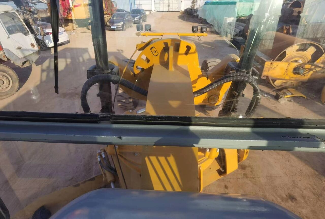 Caterpillar 140G - Niveleuse: photos 1 Caterpillar 140G - Niveleuse: photos 1