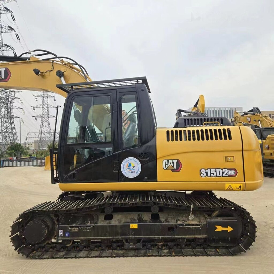Caterpillar 315D2GC - Pelle sur chenille: photos 1 Caterpillar 315D2GC - Pelle sur chenille: photos 1