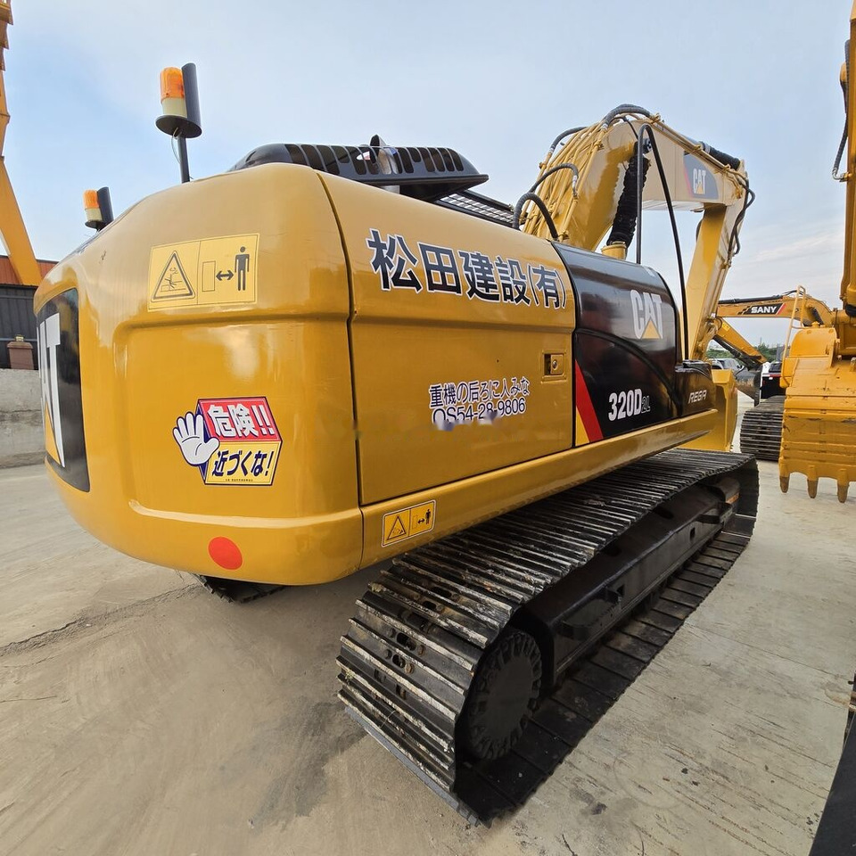 Caterpillar 320DL - Pelle sur chenille: photos 5 Caterpillar 320DL - Pelle sur chenille: photos 5
