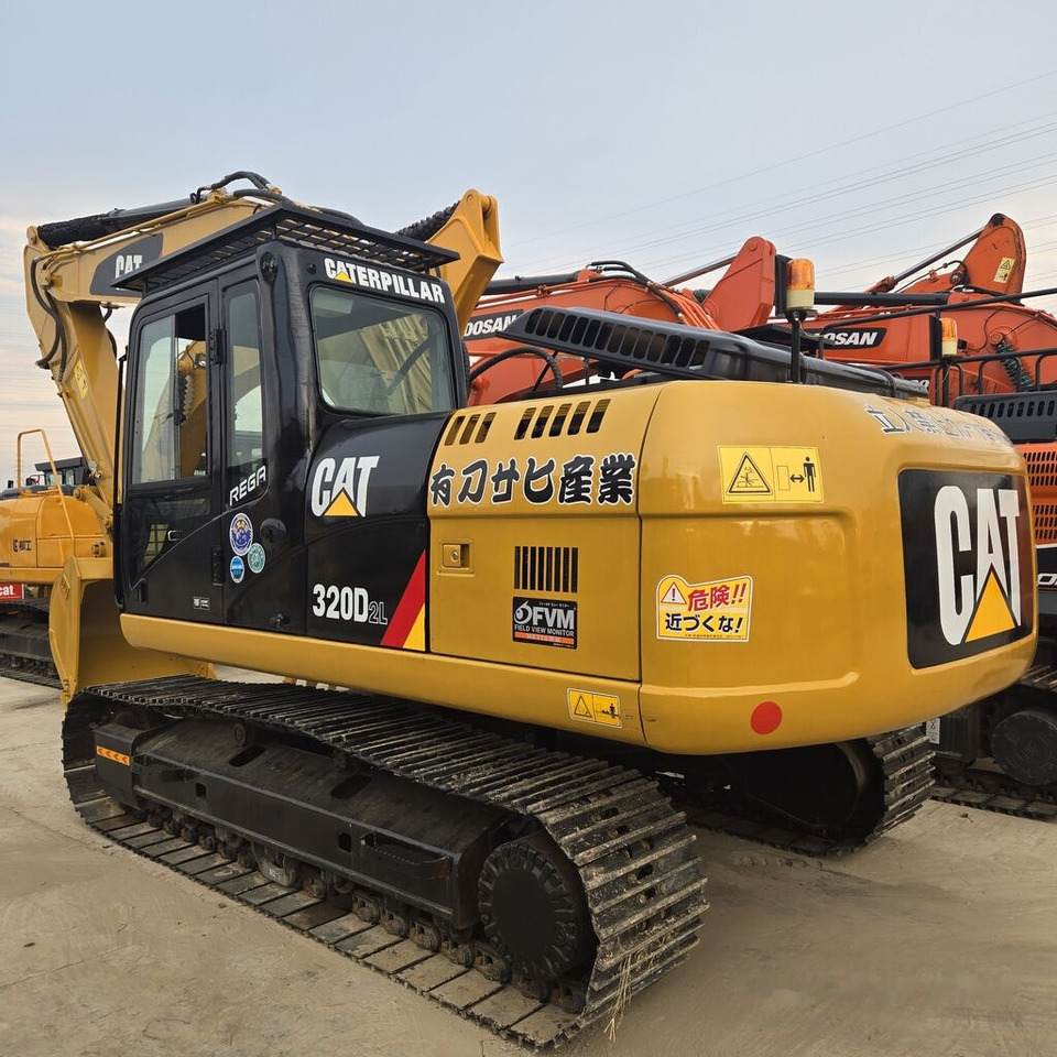 Caterpillar 320DL - Pelle sur chenille: photos 4 Caterpillar 320DL - Pelle sur chenille: photos 4