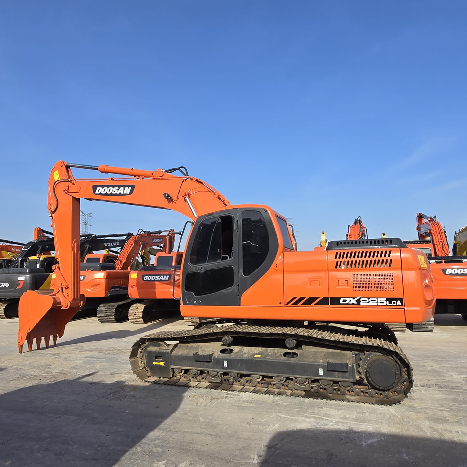 DOOSAN DX225LCA - Pelle sur chenille: photos 1 DOOSAN DX225LCA - Pelle sur chenille: photos 1