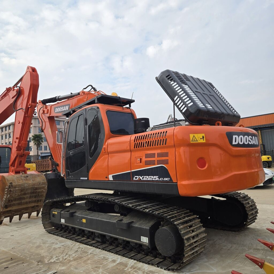Doosan DX225LC - Pelle sur chenille: photos 1 Doosan DX225LC - Pelle sur chenille: photos 1