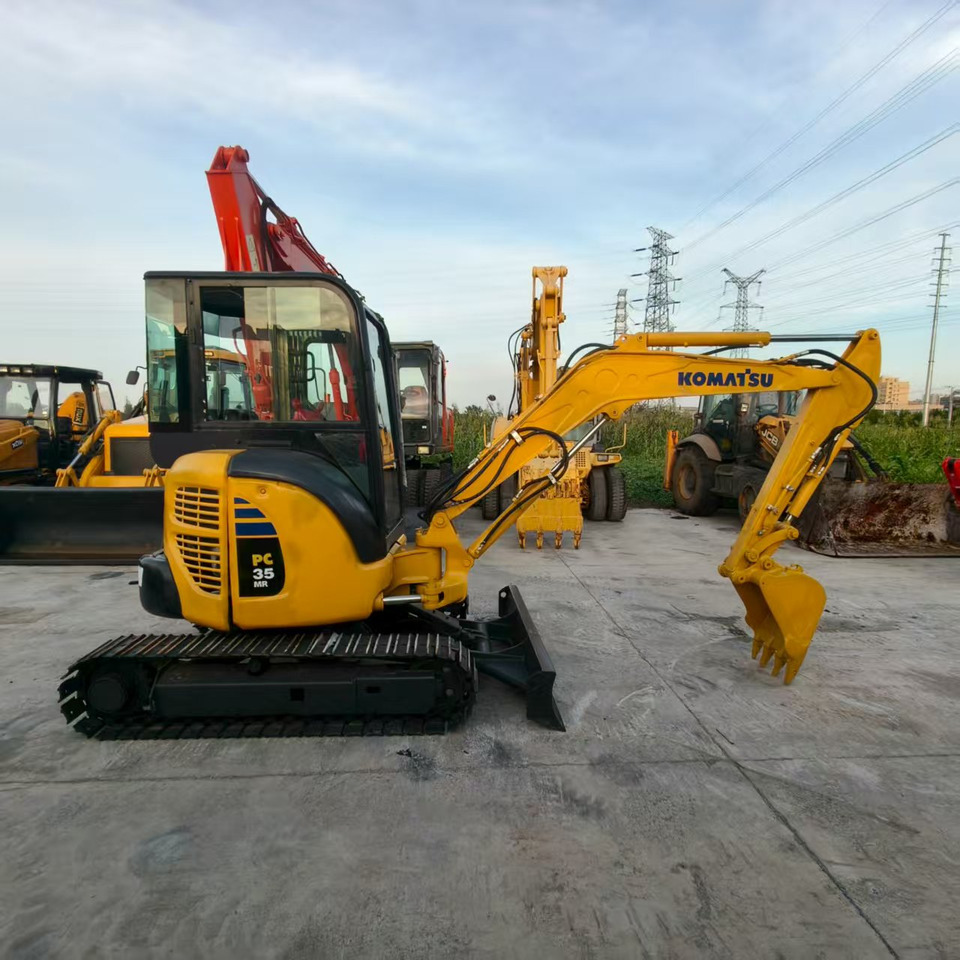 KOMATSU PC35 - Mini pelle: photos 1 KOMATSU PC35 - Mini pelle: photos 1