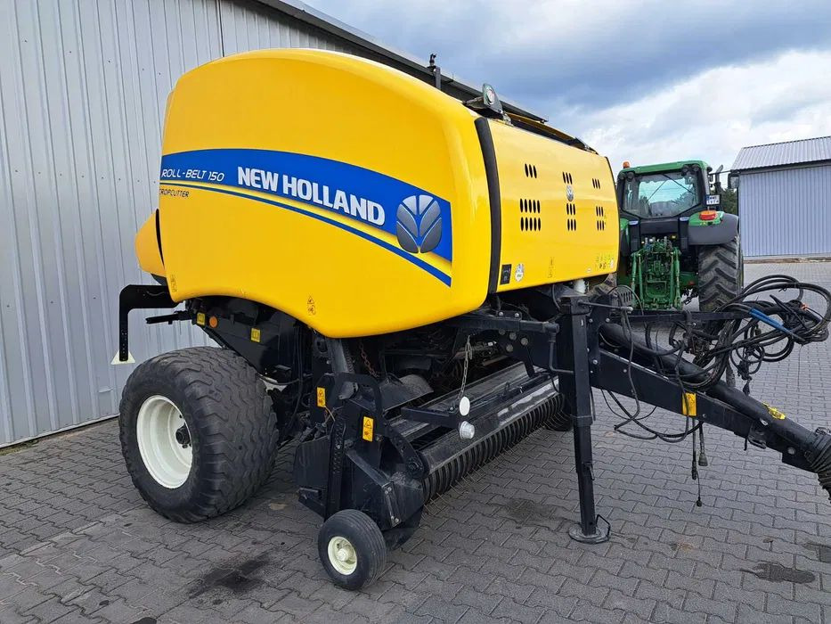 New Holland roll-belt 150 cropcutter - Presse à balles rondes: photos 2 New Holland roll-belt 150 cropcutter - Presse à balles rondes: photos 2