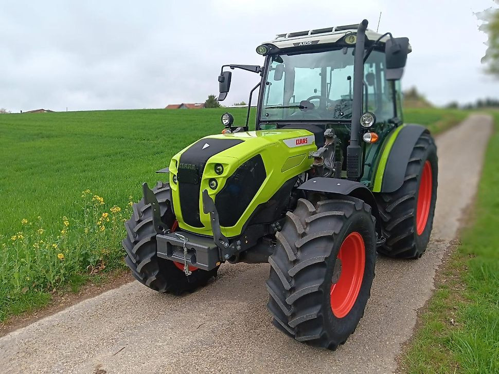Claas CLAAS AXOS 240 Traktor Schlepper Frontlader - Konsolen Klima - Tracteur agricole: photos 1 Claas CLAAS AXOS 240 Traktor Schlepper Frontlader - Konsolen Klima - Tracteur agricole: photos 1