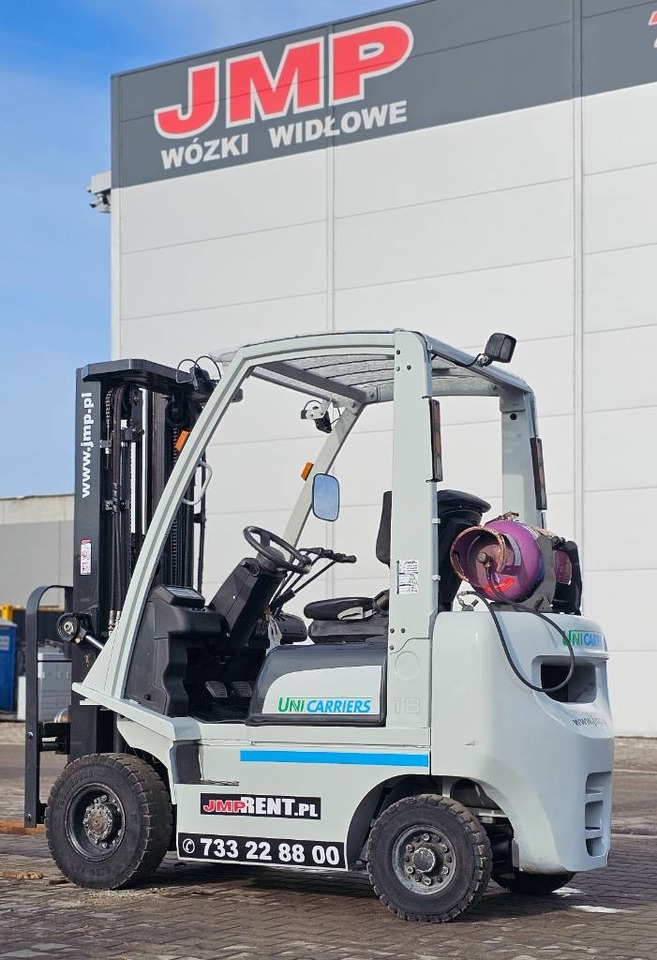UniCarriers DX 18 P1D1A18LQ - Chariot élévateur à gaz: photos 4 UniCarriers DX 18 P1D1A18LQ - Chariot élévateur à gaz: photos 4