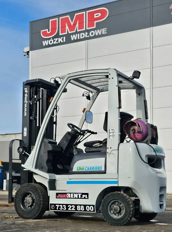 UniCarriers DX 18 P1D1A18LQ - Chariot élévateur à gaz: photos 1 UniCarriers DX 18 P1D1A18LQ - Chariot élévateur à gaz: photos 1