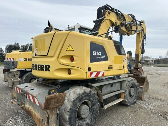 Liebherr A 914 COMPACT - Pelle sur pneus: photos 1 Liebherr A 914 COMPACT - Pelle sur pneus: photos 1