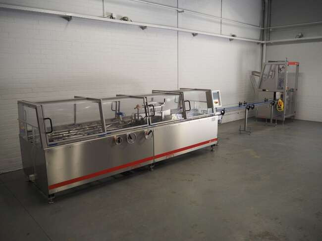 Schut Systems carton line EM60 - Machine d'emballage et de conditionnement: photos 1 Schut Systems carton line EM60 - Machine d'emballage et de conditionnement: photos 1