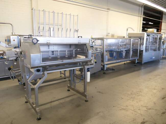 Tramper filling- and traysealing line GMD99-2 - Machine d'emballage et de conditionnement: photos 1 Tramper filling- and traysealing line GMD99-2 - Machine d'emballage et de conditionnement: photos 1
