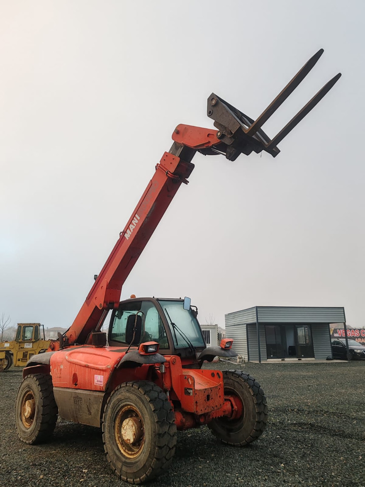 Manitou MHT 950 LT - Chargeuse sur pneus télescopique: photos 1 Manitou MHT 950 LT - Chargeuse sur pneus télescopique: photos 1