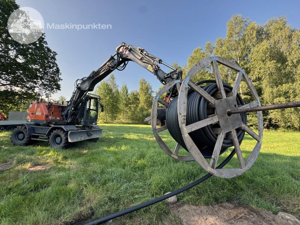 Atlas 160 W - Pelle sur pneus: photos 5 Atlas 160 W - Pelle sur pneus: photos 5