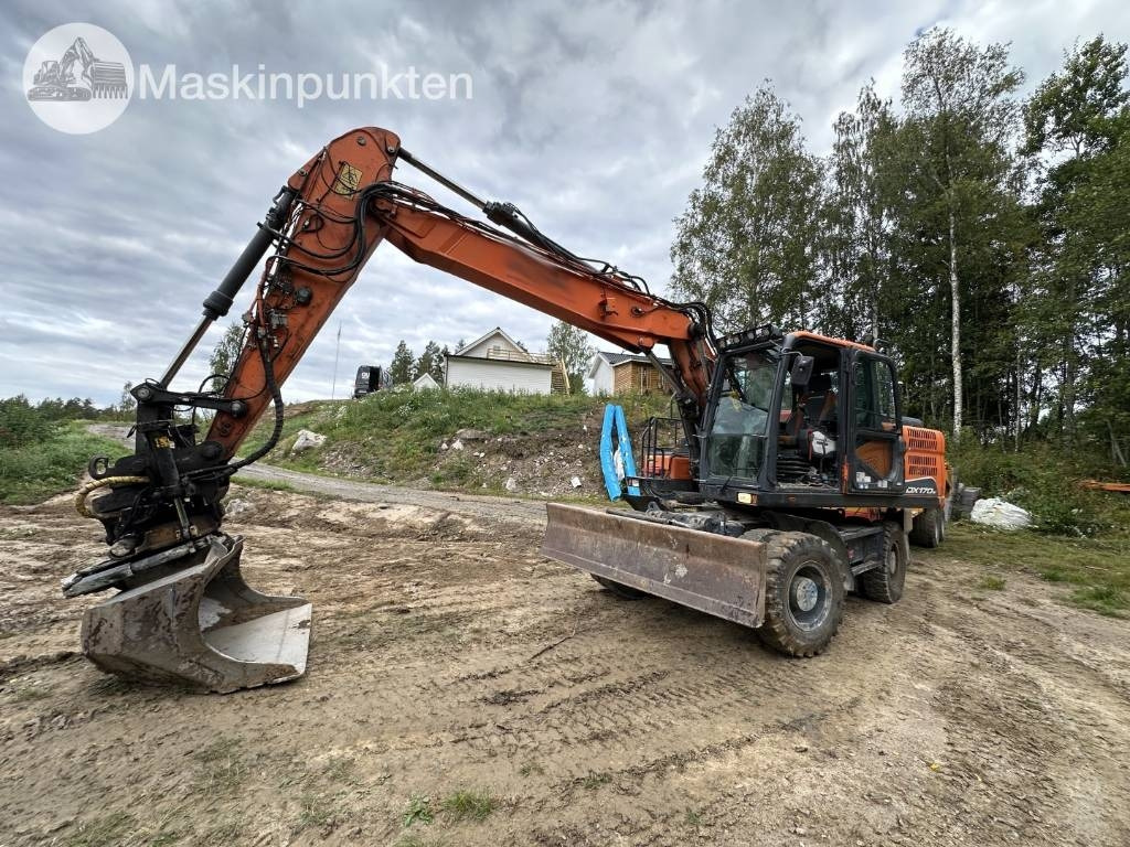 Doosan DX 170 W - Pelle sur pneus: photos 1 Doosan DX 170 W - Pelle sur pneus: photos 1