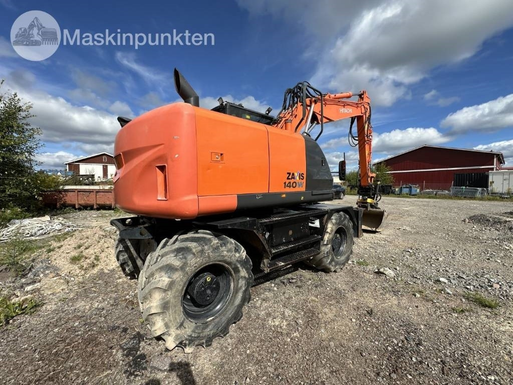 Hitachi ZX 140 W-5B - Pelle sur pneus: photos 5 Hitachi ZX 140 W-5B - Pelle sur pneus: photos 5