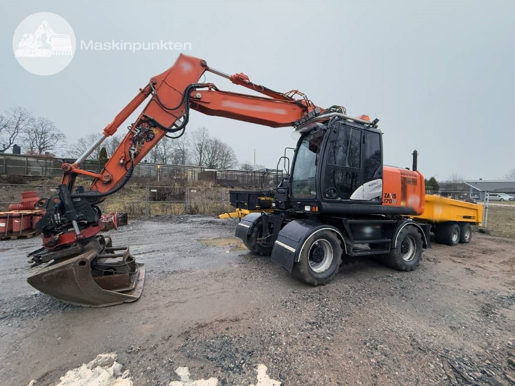 Hitachi ZX 170 W-5 B - Pelle sur pneus: photos 1 Hitachi ZX 170 W-5 B - Pelle sur pneus: photos 1