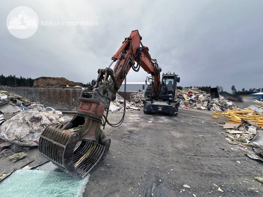 Hitachi ZX 170 W-6 - Pelle sur pneus: photos 1 Hitachi ZX 170 W-6 - Pelle sur pneus: photos 1
