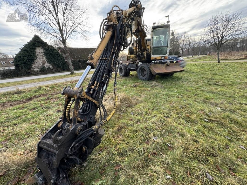 Liebherr A 310 B - Pelle sur pneus: photos 4 Liebherr A 310 B - Pelle sur pneus: photos 4