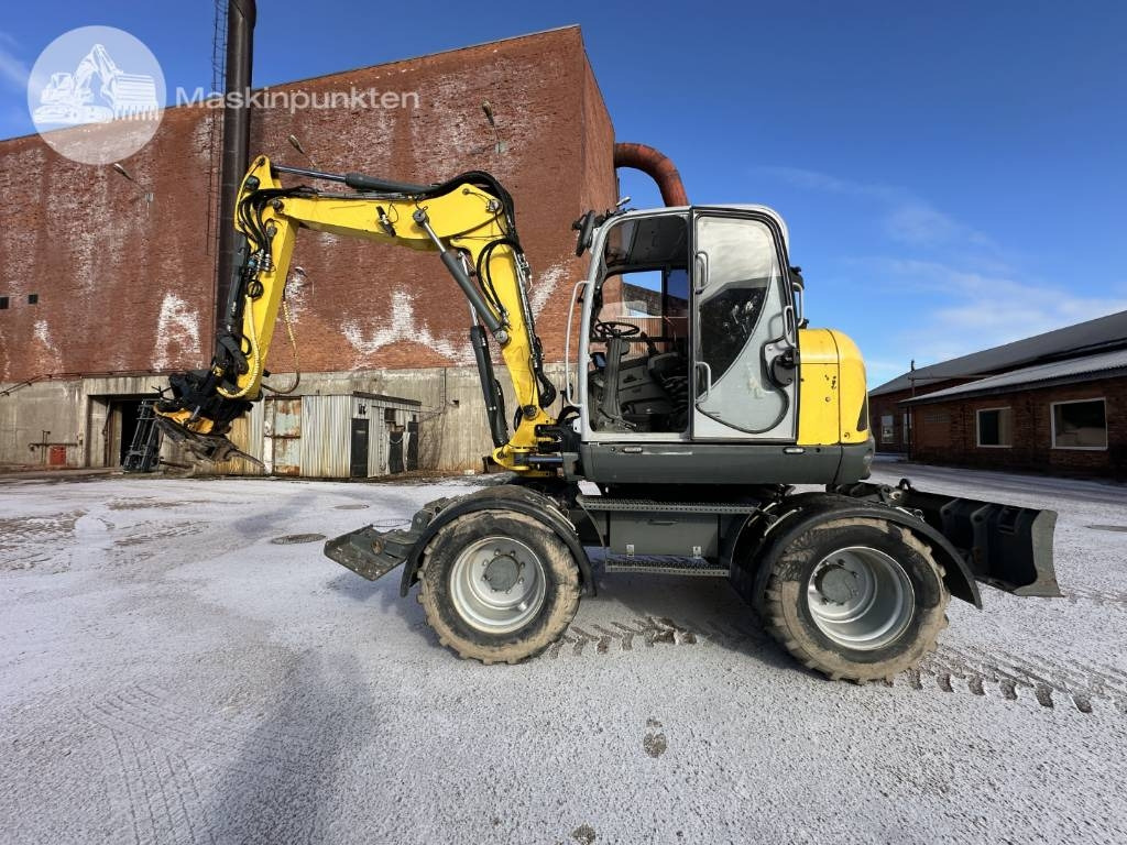 Wacker Neuson EW 100 - Pelle sur pneus: photos 1 Wacker Neuson EW 100 - Pelle sur pneus: photos 1