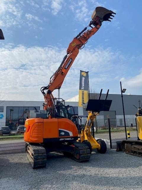 Doosan DX140LCR-5 - Pelle sur chenille: photos 1 Doosan DX140LCR-5 - Pelle sur chenille: photos 1