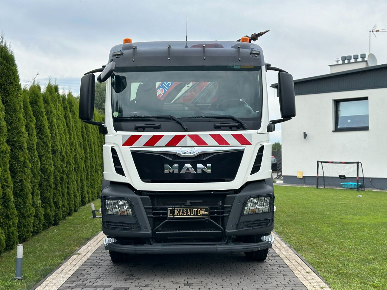 MAN TGS 440 / 8x4 /CRANE HMF 1530/ TIPPER - Camion grue: photos 3 MAN TGS 440 / 8x4 /CRANE HMF 1530/ TIPPER - Camion grue: photos 3