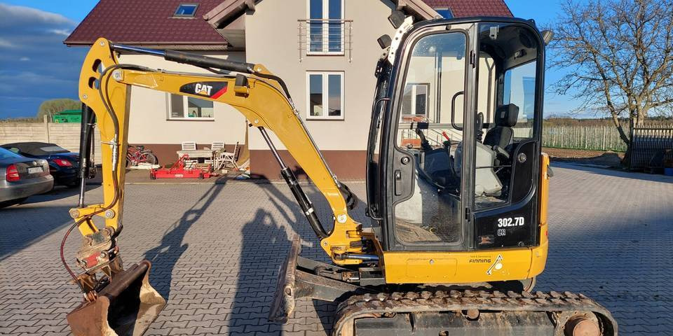 Minikoparka Caterpillar CAT 302.7D CR - Pelle sur chenille: photos 1 Minikoparka Caterpillar CAT 302.7D CR - Pelle sur chenille: photos 1