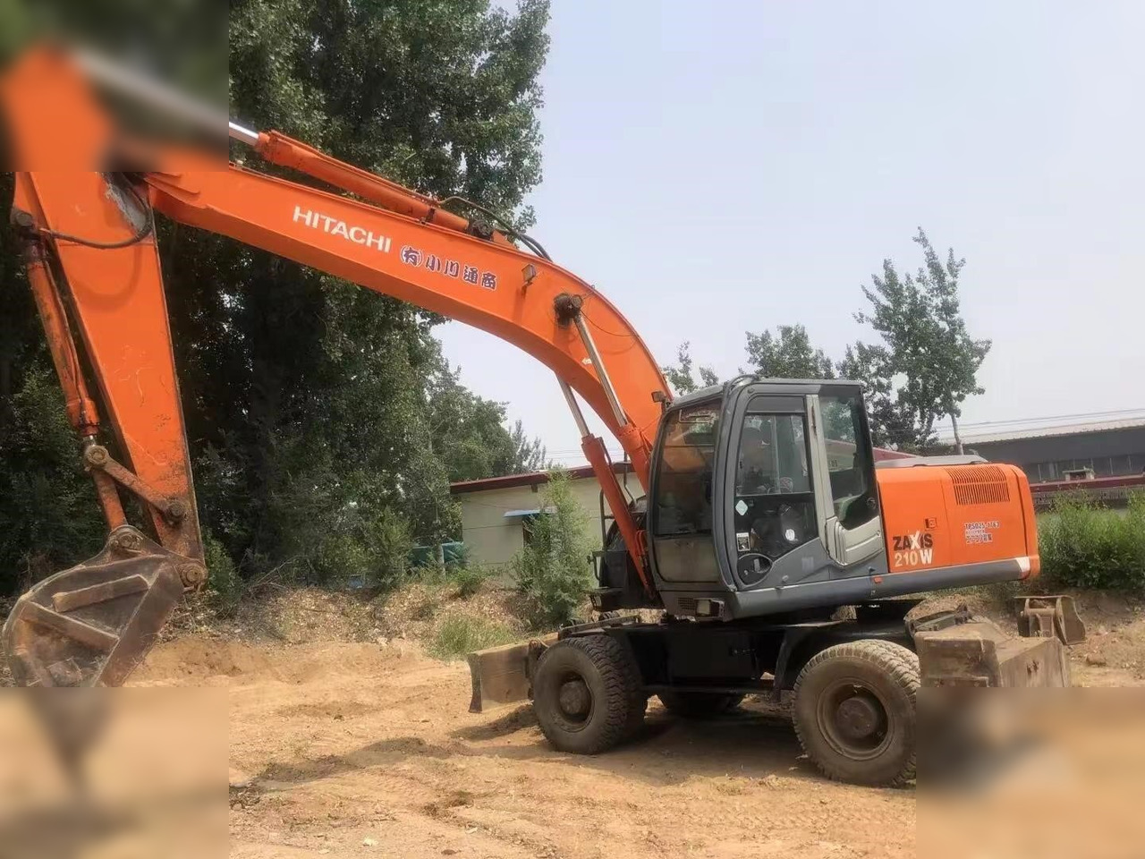 HITACHI ZX210W - Pelle sur pneus: photos 3 HITACHI ZX210W - Pelle sur pneus: photos 3