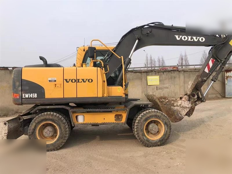 VOLVO EW145B - Pelle sur pneus: photos 1 VOLVO EW145B - Pelle sur pneus: photos 1
