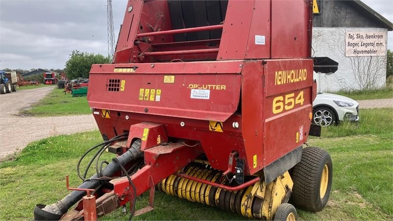 New Holland 654 RUNDBALLEPRESSER Cropcutter - Presse à balles rondes: photos 2 New Holland 654 RUNDBALLEPRESSER Cropcutter - Presse à balles rondes: photos 2