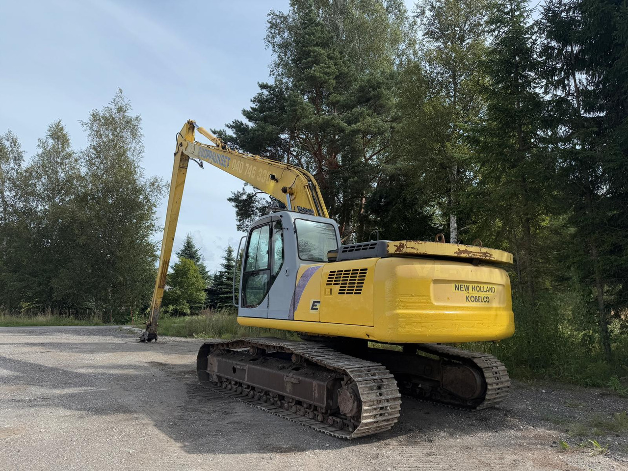 New Holland E 215 - Pelle sur chenille: photos 3 New Holland E 215 - Pelle sur chenille: photos 3