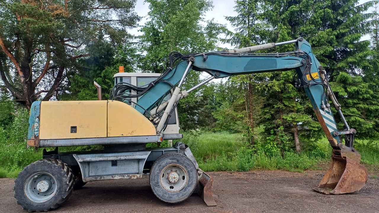 Volvo EW140 - Pelle sur pneus: photos 5 Volvo EW140 - Pelle sur pneus: photos 5
