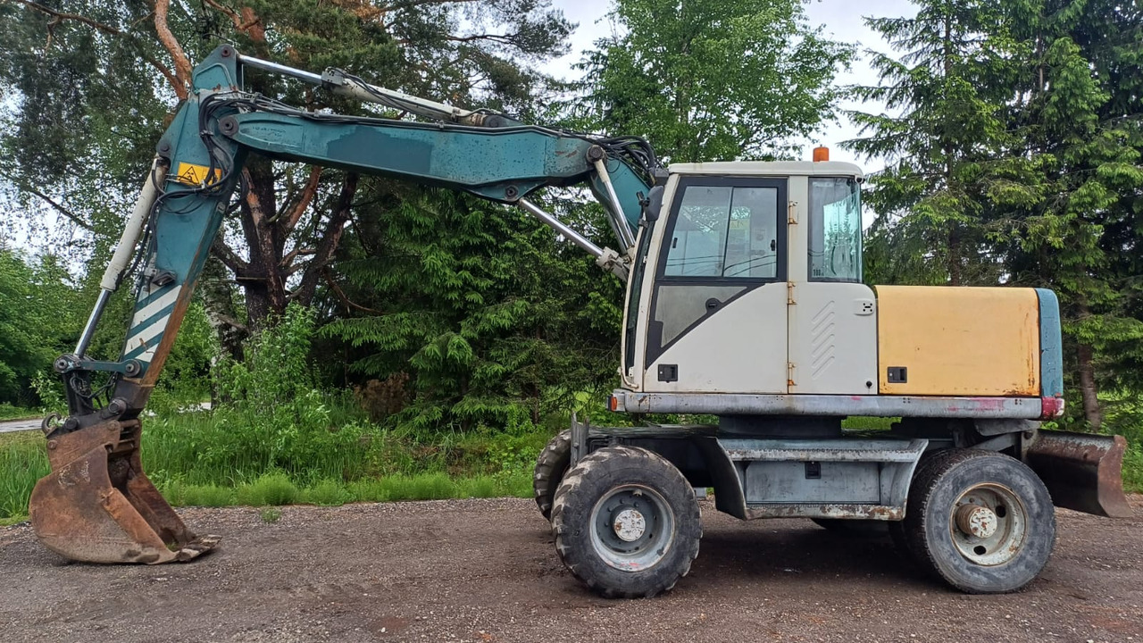 Volvo EW140 - Pelle sur pneus: photos 2 Volvo EW140 - Pelle sur pneus: photos 2