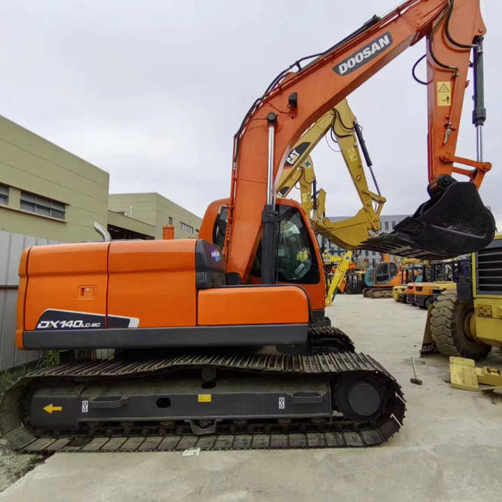 Used Digger DOOSAN DX140 Construction Machinery Construction Digger Used DOOSAN DX140 Cheap Excavator - Pelle sur chenille: photos 1 Used Digger DOOSAN DX140 Construction Machinery Construction Digger Used DOOSAN DX140 Cheap Excavator - Pelle sur chenille: photos 1