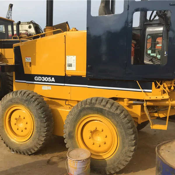 Used Komatsu GD305 Motor Grader Cheap Price Komatsu Road Grader GD305 Good Condition in China - Niveleuse: photos 1 Used Komatsu GD305 Motor Grader Cheap Price Komatsu Road Grader GD305 Good Condition in China - Niveleuse: photos 1
