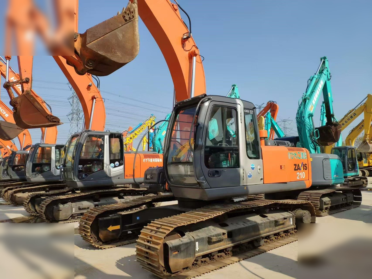 HITACHI ZX210 - Pelle sur chenille: photos 1 HITACHI ZX210 - Pelle sur chenille: photos 1