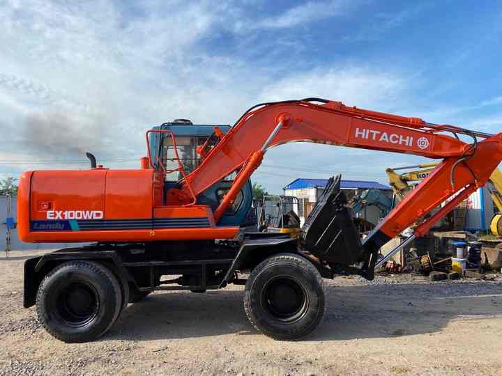 Used Hitachi Ex100WD Wheel Excavator for Sale Japan Made Hitachi Ex100wd Wheeled Excavator for Sale - Pelle sur pneus: photos 2 Used Hitachi Ex100WD Wheel Excavator for Sale Japan Made Hitachi Ex100wd Wheeled Excavator for Sale - Pelle sur pneus: photos 2