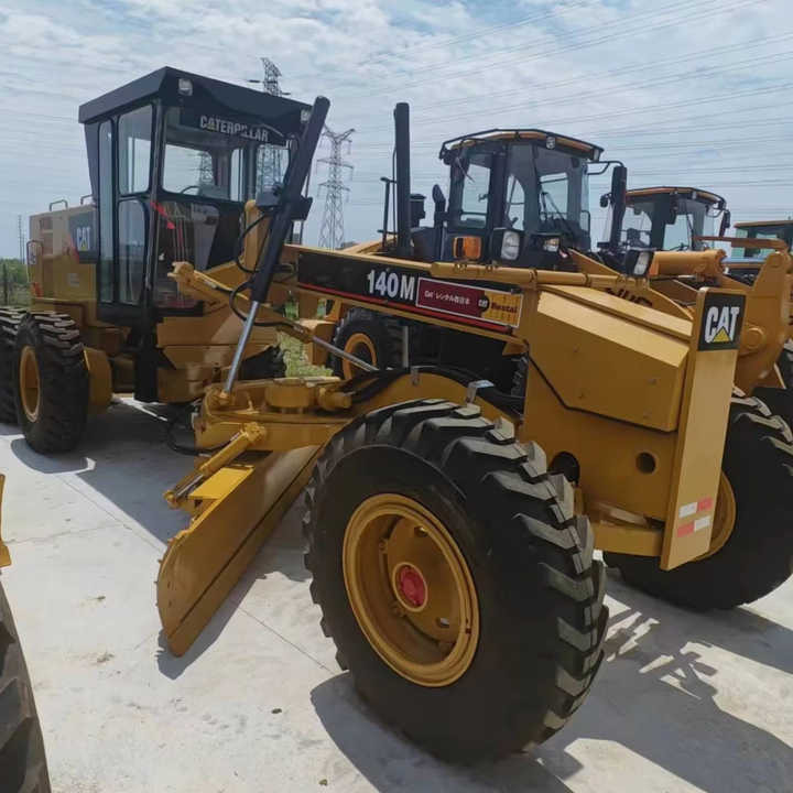 Used Japan Imported Caterpillar 140M Cat 140m Motor Grader with Good Quality and Low Price for Sale - Pelle sur chenille: photos 1 Used Japan Imported Caterpillar 140M Cat 140m Motor Grader with Good Quality and Low Price for Sale - Pelle sur chenille: photos 1