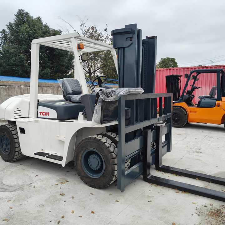 Used TCM70 Forklift Japan TCM 7 Tonne Used Forklift in Good Condition Cheap Price TCM70 Forklift for Sale - Chariot élévateur diesel: photos 1 Used TCM70 Forklift Japan TCM 7 Tonne Used Forklift in Good Condition Cheap Price TCM70 Forklift for Sale - Chariot élévateur diesel: photos 1