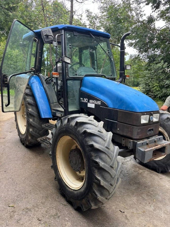 New Holland TL 90 - Tracteur agricole: photos 1 New Holland TL 90 - Tracteur agricole: photos 1