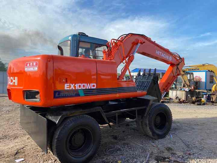 Used Hitachi Ex100WD Wheel Excavator for Sale Japan Made Hitachi Ex100wd Wheeled Excavator for Sale - Pelle sur chenille: photos 4 Used Hitachi Ex100WD Wheel Excavator for Sale Japan Made Hitachi Ex100wd Wheeled Excavator for Sale - Pelle sur chenille: photos 4