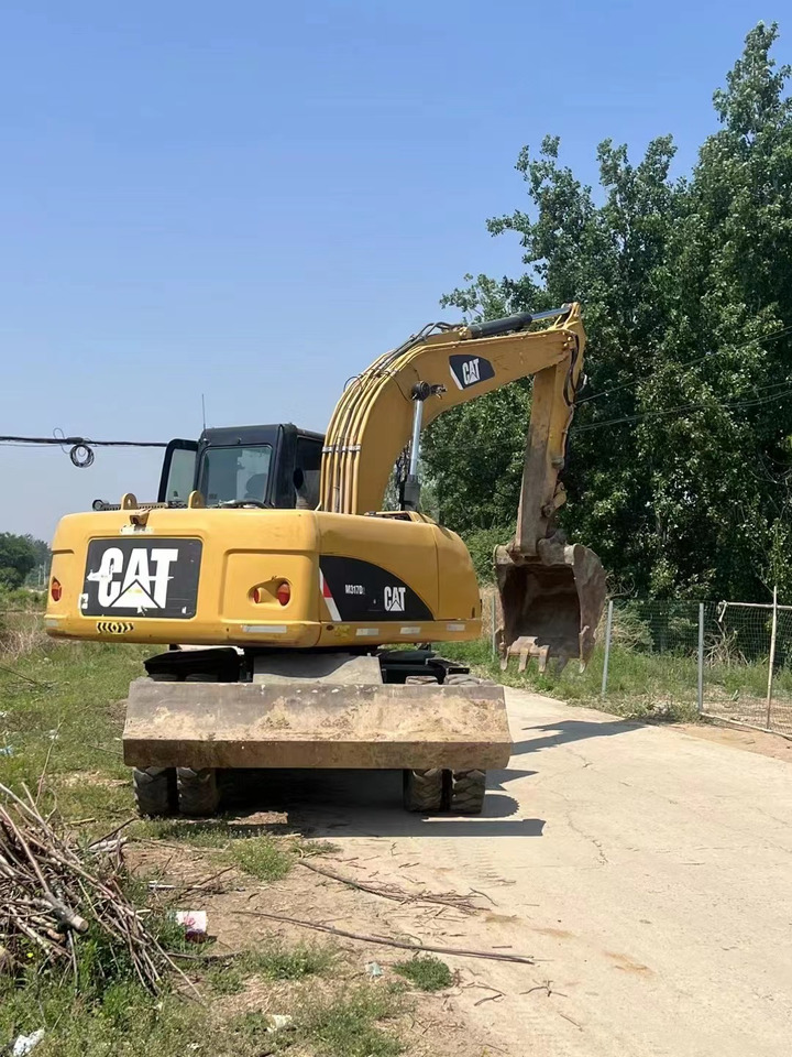 CATERPILLAR M317 - Pelle sur pneus: photos 2 CATERPILLAR M317 - Pelle sur pneus: photos 2