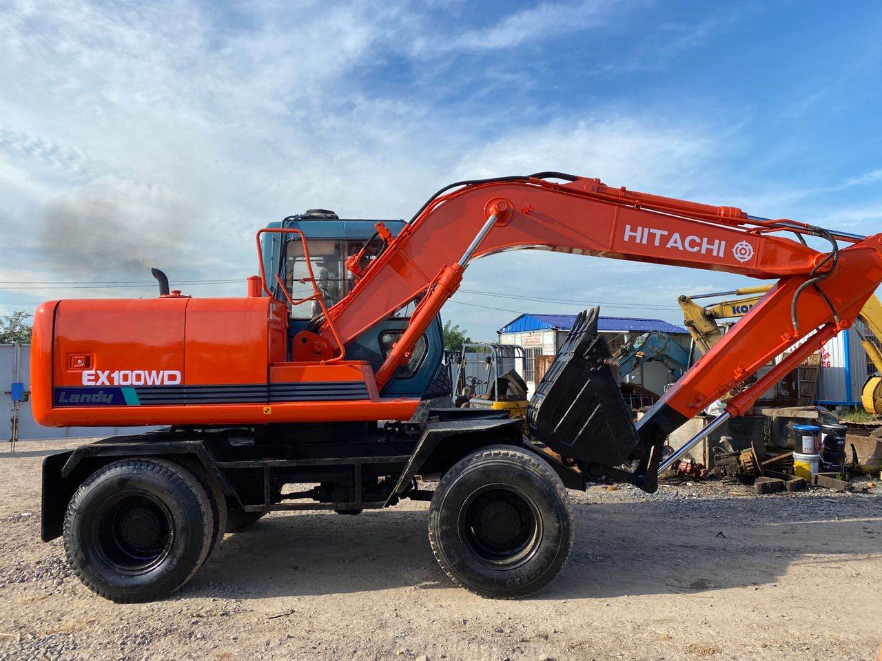 HITACHI EX100WD - Pelle sur pneus: photos 1 HITACHI EX100WD - Pelle sur pneus: photos 1