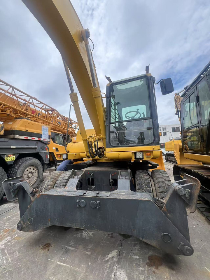 KOMATSU PW150 - Pelle sur pneus: photos 1 KOMATSU PW150 - Pelle sur pneus: photos 1