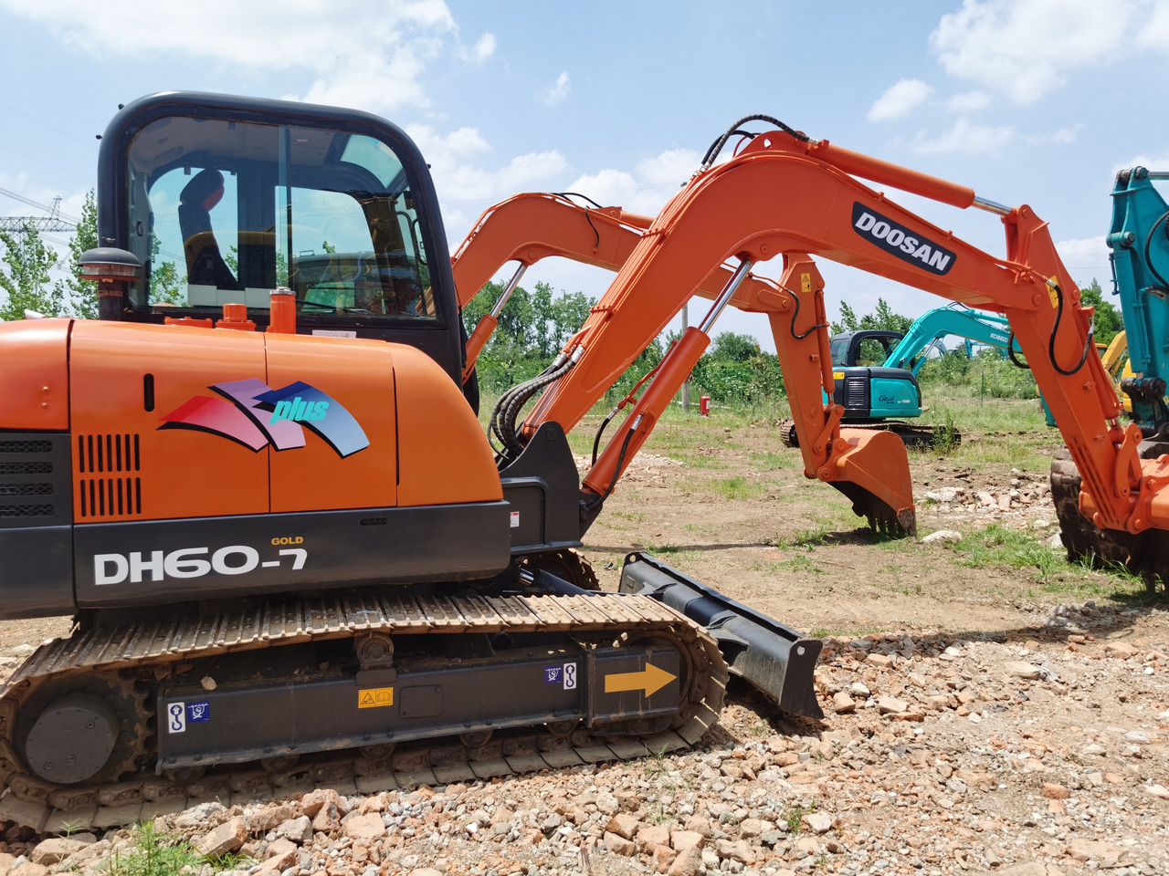 DOOSAN DH60-7 - Engins de chantier: photos 1 DOOSAN DH60-7 - Engins de chantier: photos 1